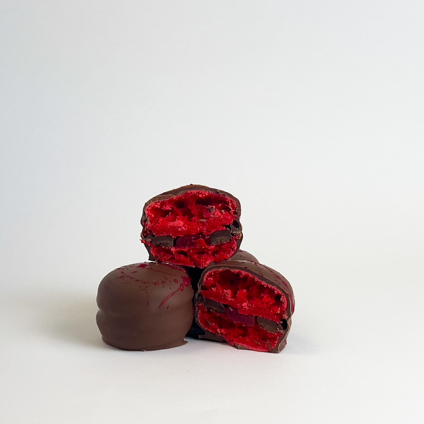 Chocolate dipped strawberry macaron